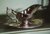 Sterling silver saucer on a platter